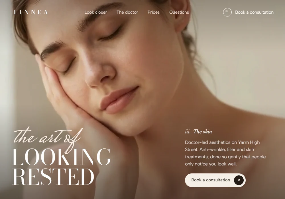 The Linnea Clinic concept homepage: a calm close-up of a woman's face with The art of looking rested in script and tall serif capitals
